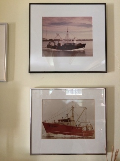 Photos of Reidar's vessels in the family kitchen.